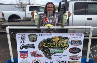Frank Haidusek, of North Newton, holds up a pair of crappie he caught to help give him the Kansas Crappie Trail win last Sunday on Perry Reservoir.