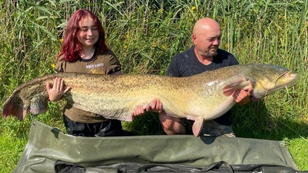 Teen catches giant catfish minutes after doubting her luck, father says