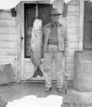 Roy Groves with a 55-pound catfish caught in 1949. For nearly 70 years it stood as South Dakota's record channel catfish until it was voided on May 20, 2019. South Dakota Game, Fish and Parks determined the fish was a blue catfish.