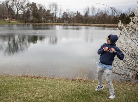 Lucas Bischoff pulled on his line at a pond off Shelbyville Road. Bischoff is a member of Christian Academy of Louisville's fishing team. March 29, 2022