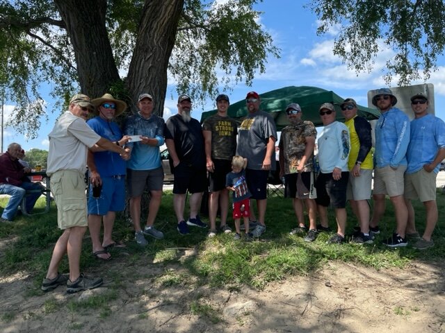 Tournament Mark Culbertson Hands first place winner check  to Team Eaves, L-R  2nd place Chris / Tyson Powers,
3rd place Dave Son/Rob Needham, 4th place & Big Bass Scott/Mitch Seager, 5thplace Jared/Justin Flockhart